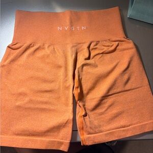 NVGTN Women's Orange High-Waisted Pro Shorts